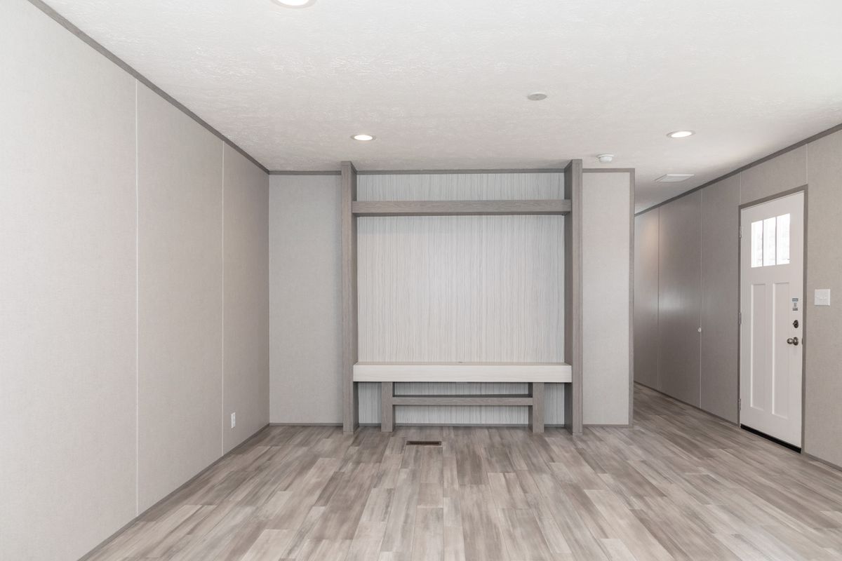 00615b70-ce2f-4a92-a144-c1fa042a73e7 empty, living room, wood floors