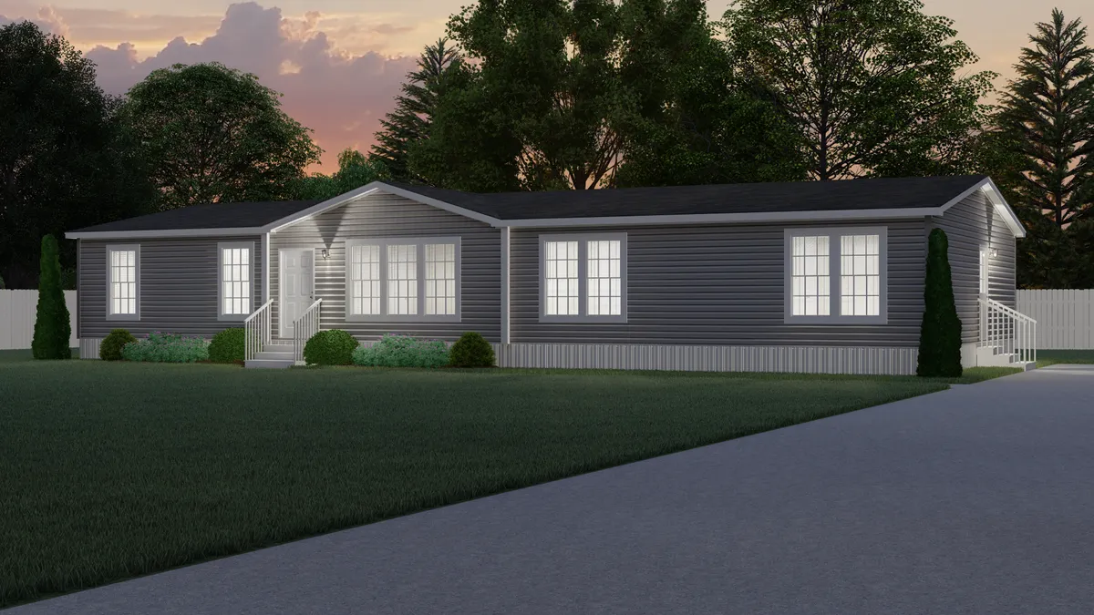 A rendering of a mobile home at dusk.