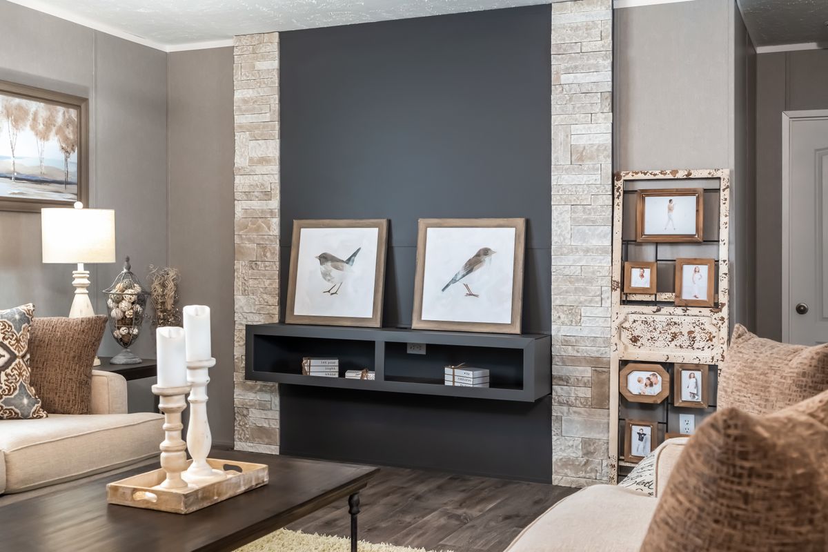 34ca63f1-5b9d-4942-a82f-6f4e23029a95 Gray walls, beige furniture.