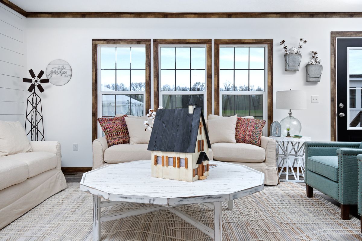 A living room with couches and a coffee table.