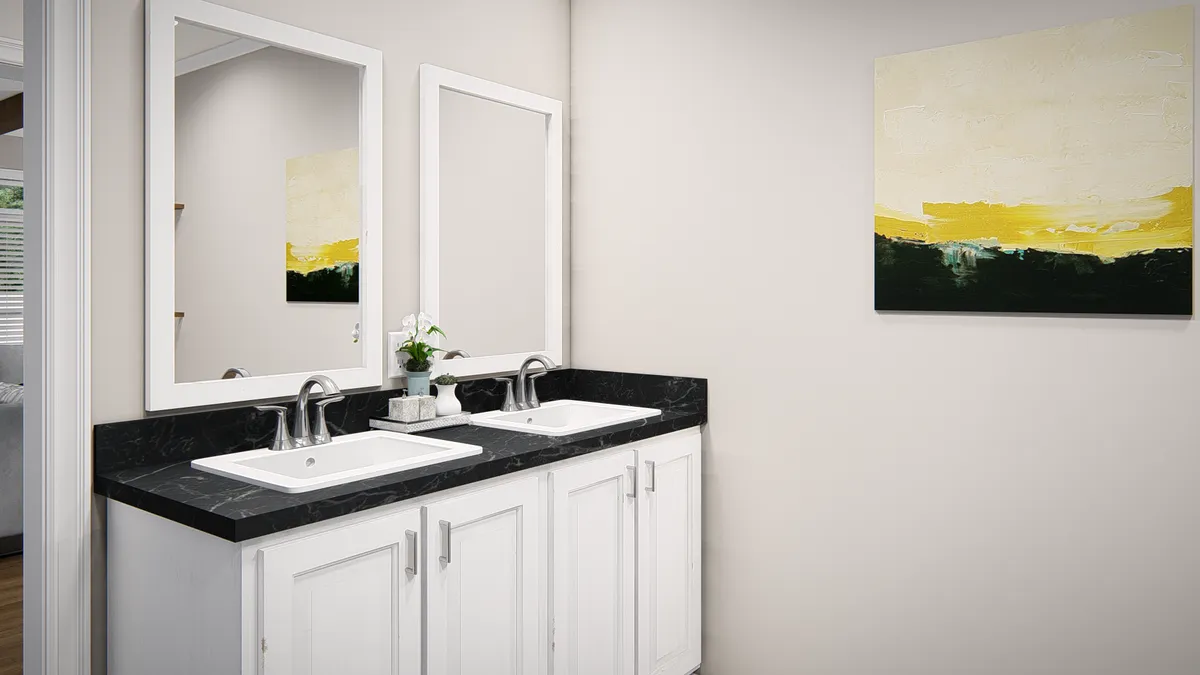 A bathroom with two sinks and a painting on the wall.