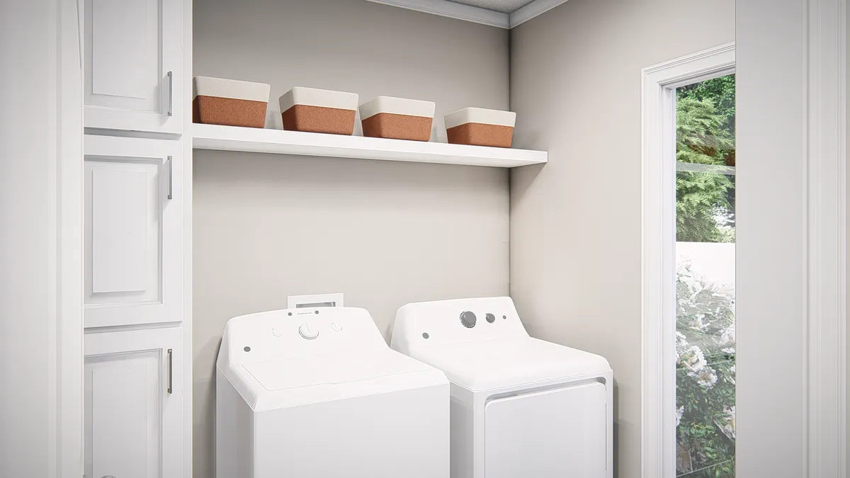 A laundry room with a washer and dryer.