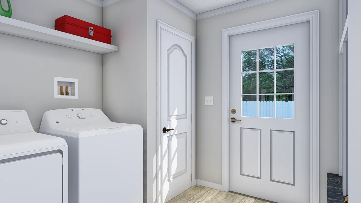 A laundry room with a washer and dryer.
