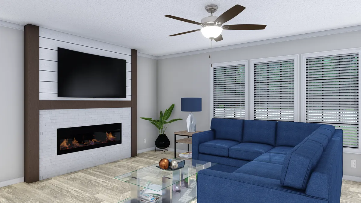 A rendering of a living room with a blue couch and a fireplace.