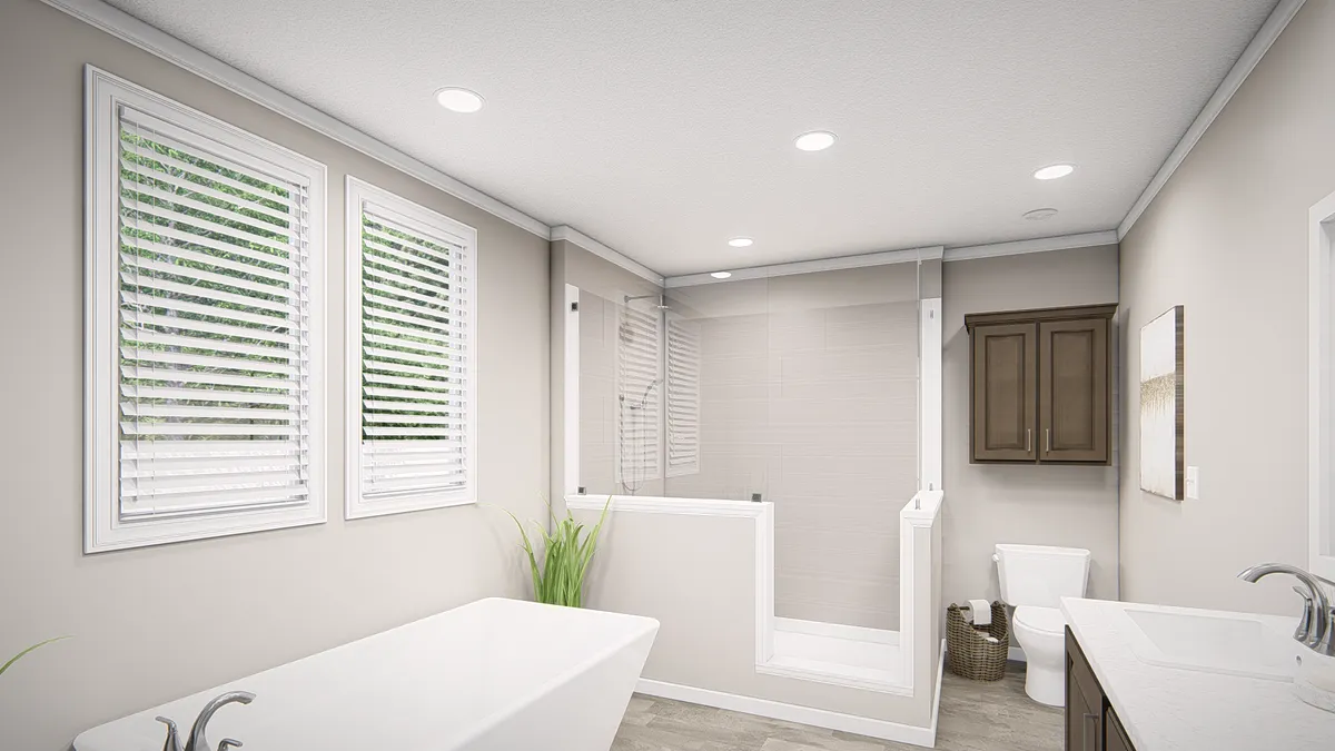 An image of a bathroom with a tub and shower.