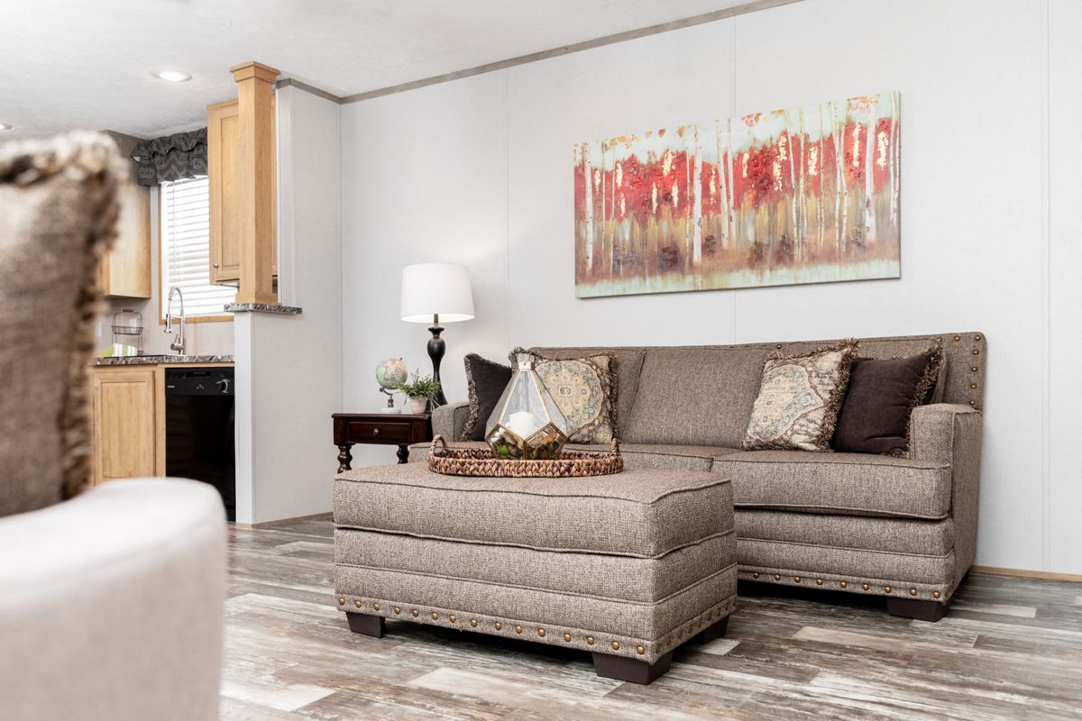 A living room with a couch and coffee table.