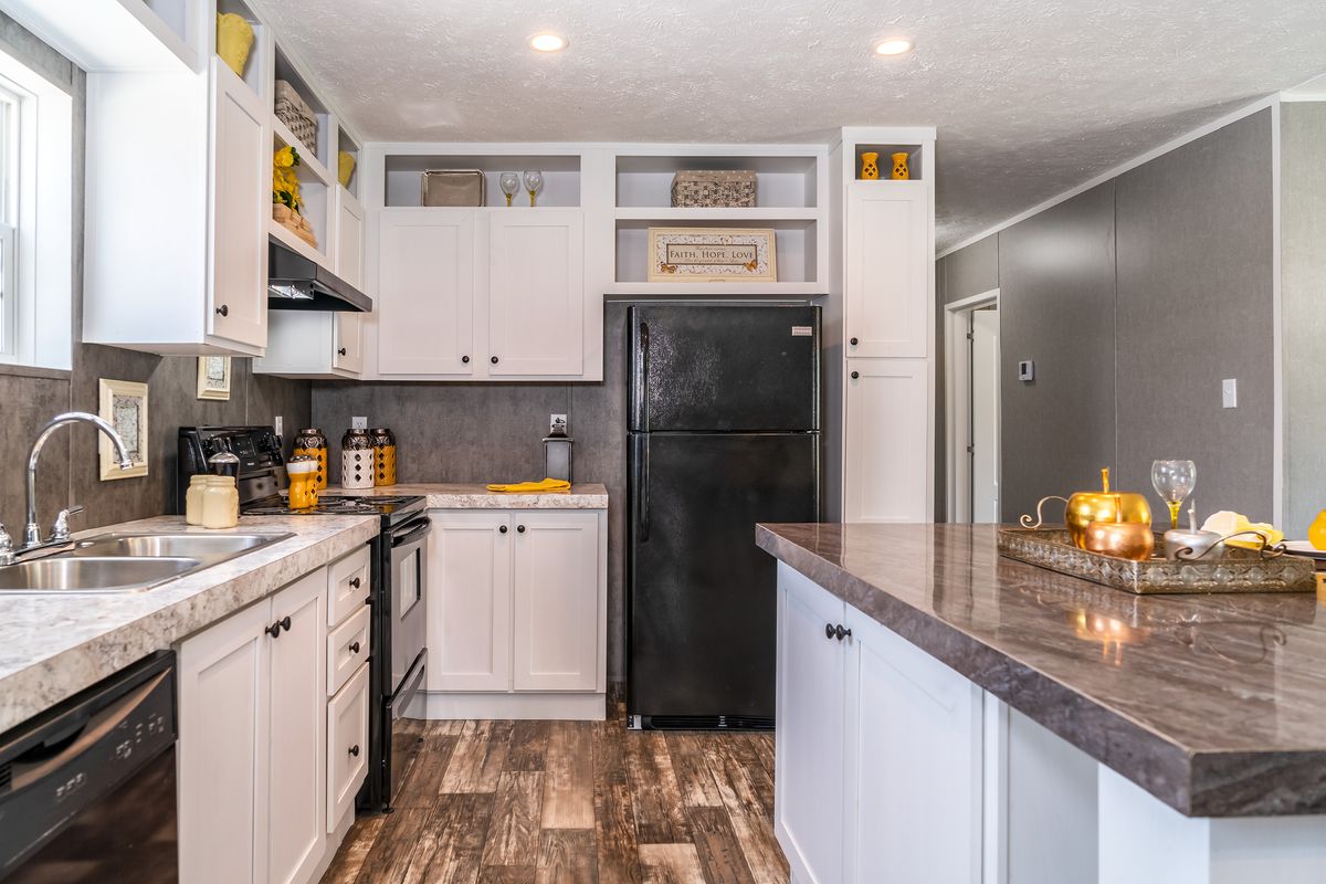 c2e5d056-0ef5-4d8d-b871-7505f142b7a5 mobile home kitchen, hardwood floors