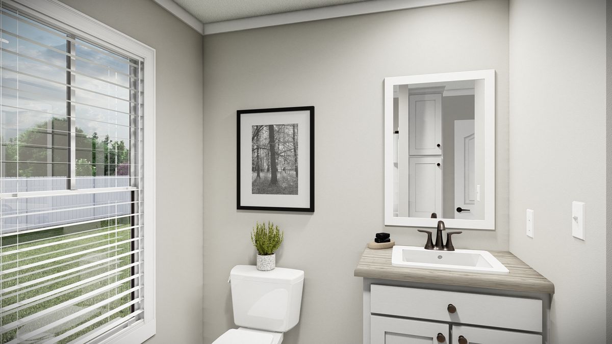 c649bae3-40a1-4758-87f8-df42920389c7 A rendering of a bathroom with a toilet and sink.
