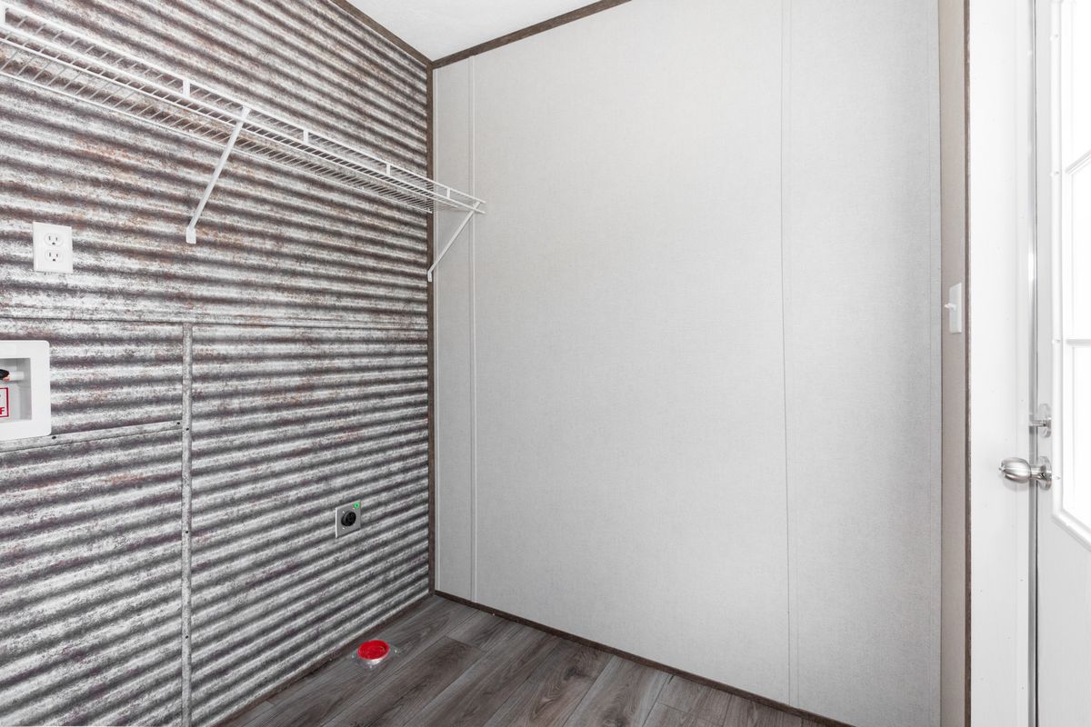 dcab80e3-0892-43d6-a37b-9ce022e38345 A small closet in a mobile home.