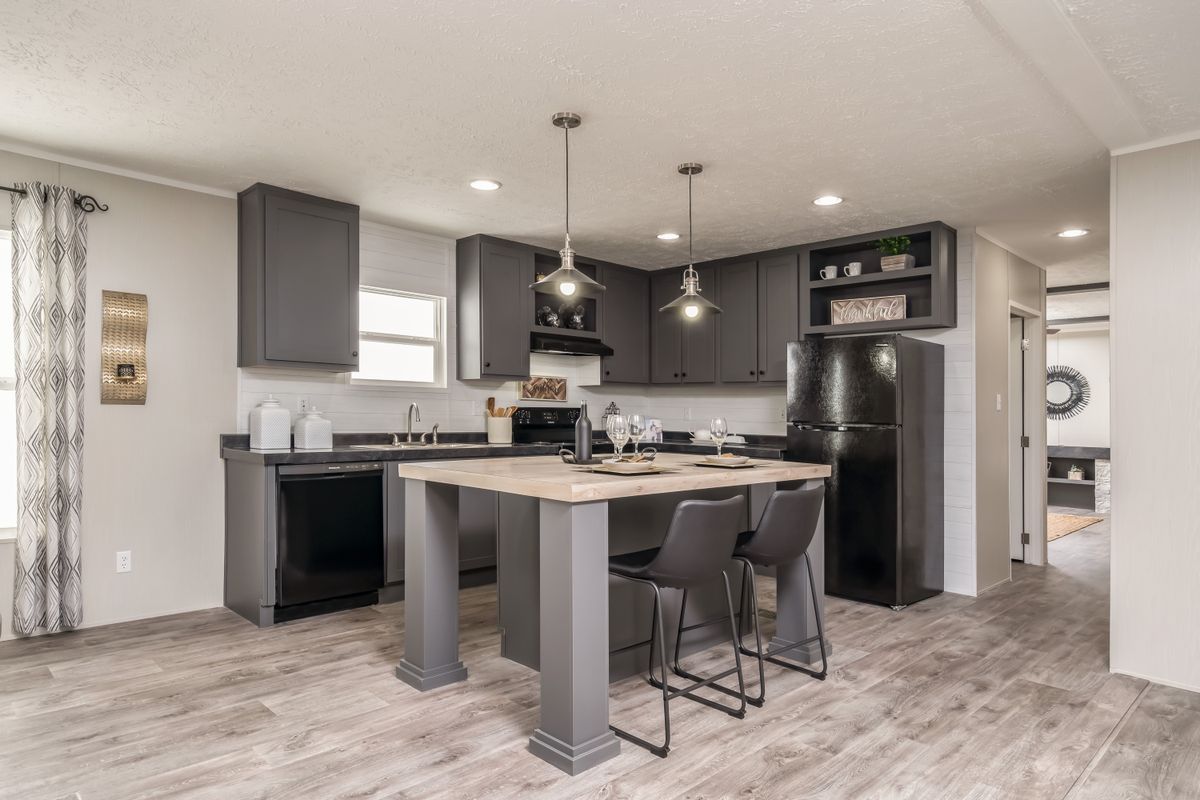 dd67ee19-a24c-44f7-81d7-b0d306d6c6c4 mobile home, hardwood floors, kitchen