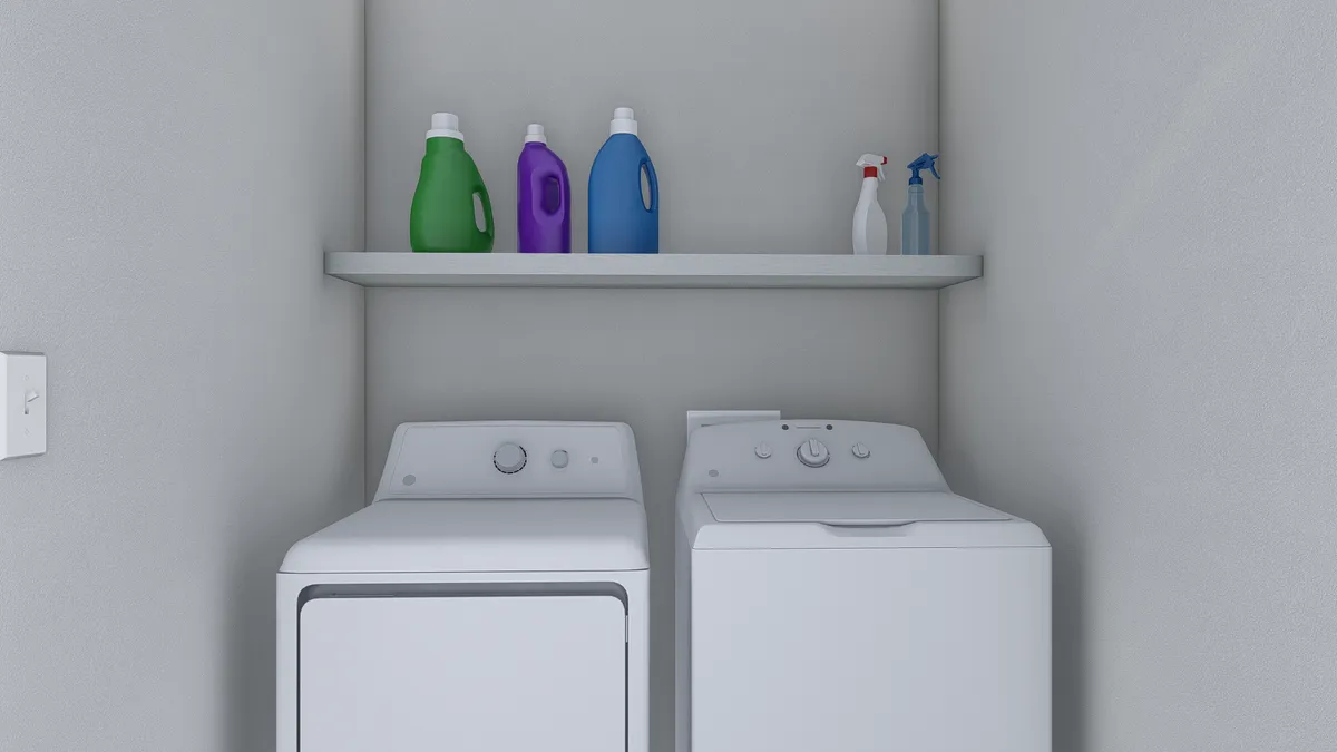 A laundry room with a washer and dryer.