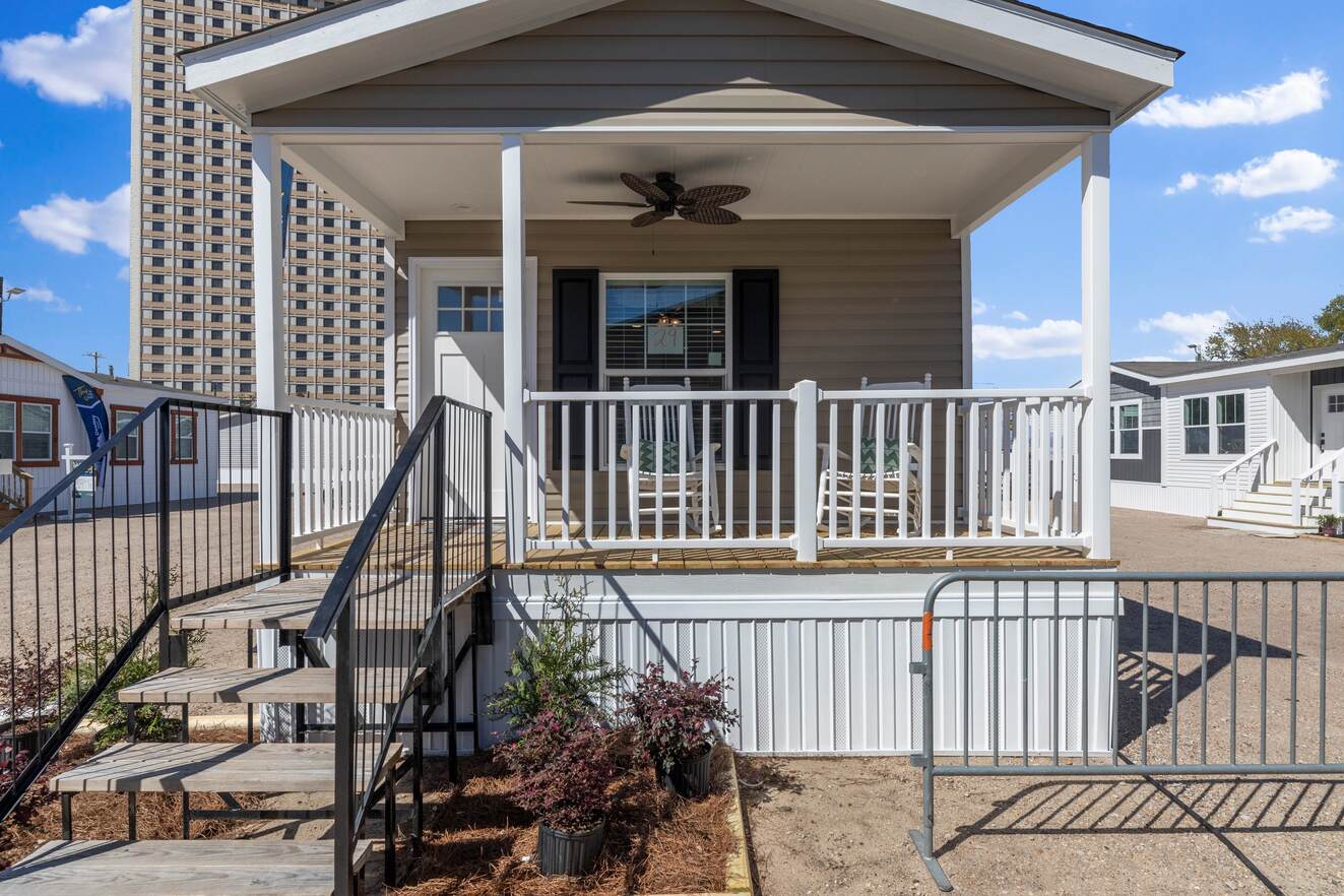 the_clarke_52769981724_o_1679953534710_1323_12 The front porch of a mobile home.
