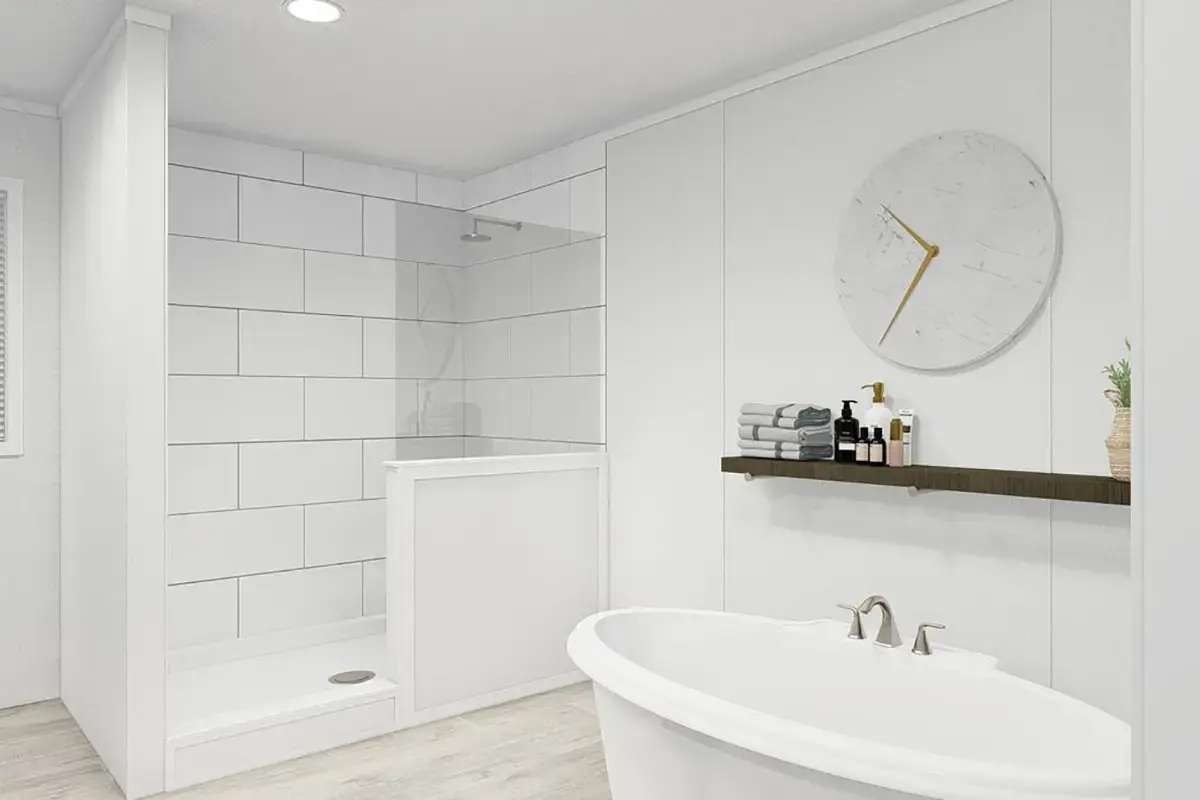 A bathroom with a tub and shower.