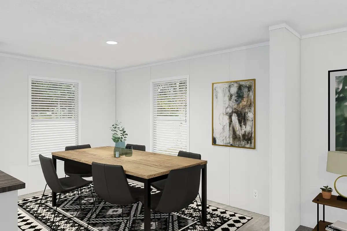 A dining table with chairs in a room.