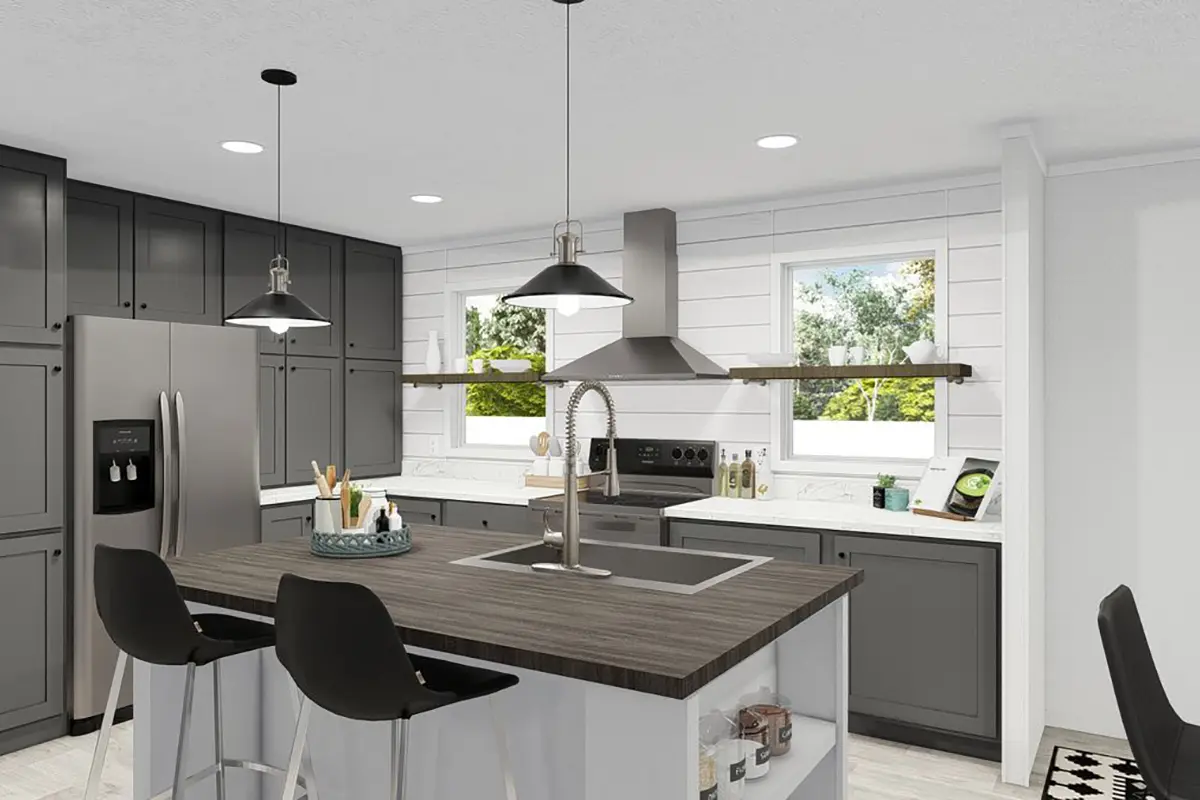 A kitchen with a island and stools.