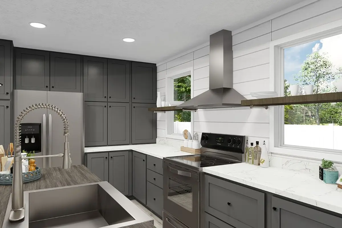 A kitchen with grey cabinets and white countertops.