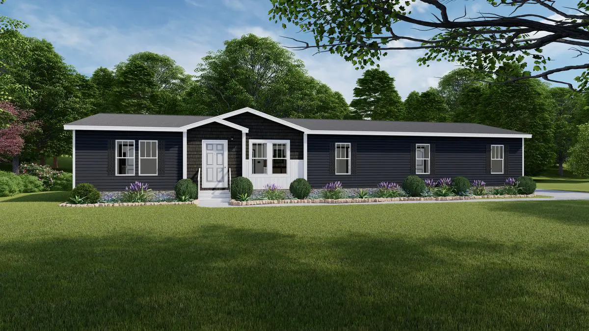 30446e6c-a505-4c83-84a4-494f5e647c11 A modern single-story house with dark gray siding and white trim, surrounded by a well-manicured lawn and colorful garden, under a clear sky.