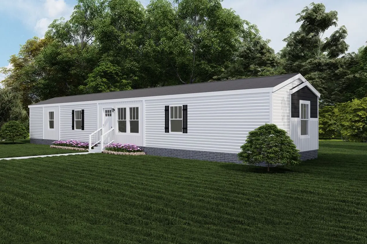 Baby-Boujee-87c919b1-be41-409c-8d54-062b6603b61e A white mobile home with black shutters, a small front porch with steps, and a well-maintained lawn, surrounded by trees.