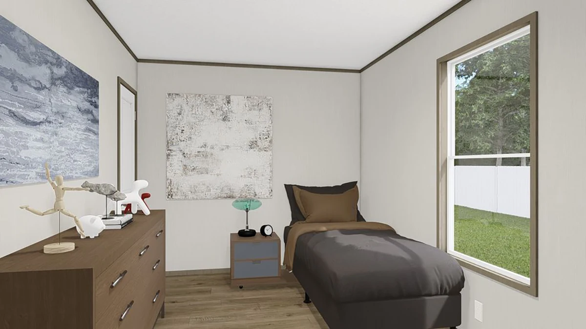 A small bedroom with a single bed, brown bedding, a wooden dresser with decor, a nightstand, two abstract wall art pieces, and a window showing a fenced yard.