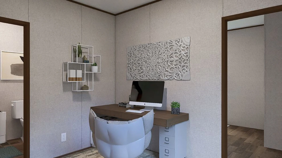 09893316-81f4-4c49-9933-b48138084cad A small home office with a desk, computer, office chair, wall shelves with decor, and a decorative panel on the wall; a bathroom is visible through the open door.