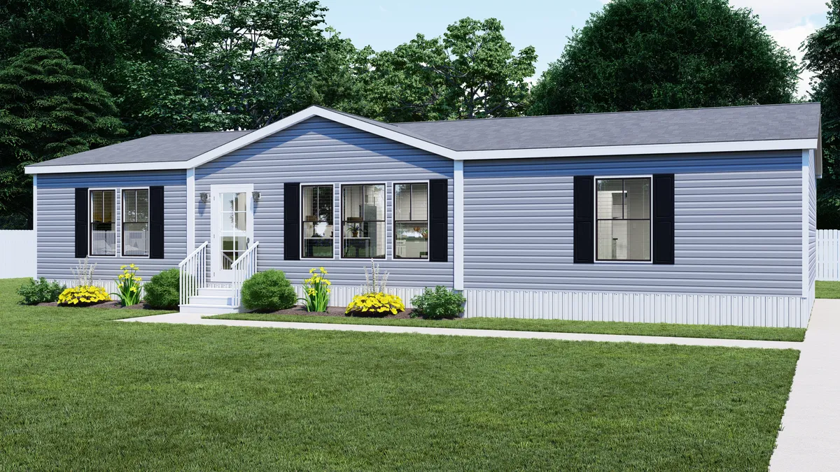 0ab771b4-6b77-4e37-a07b-c636bebbe38b A single-story blue manufactured home with white trim, black shutters, and a small porch, surrounded by a green lawn and landscaping.