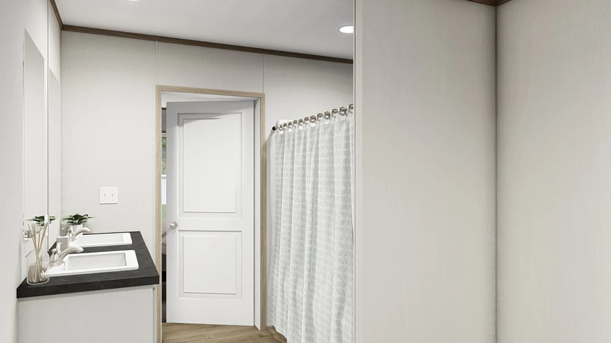 0c416ede-e49f-43eb-aad9-1ee20f2d06f8 A modern bathroom with a double sink vanity, two mirrors, a white door, and a shower area with a white curtain.