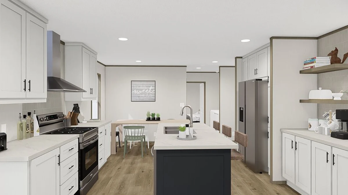 Modern kitchen with white cabinets, stainless steel appliances, black island with bar stools, and a small dining area in the background. Light wood flooring and neutral decor.