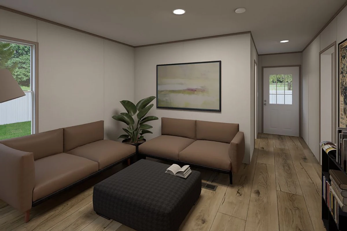 1e9e823e-36c4-4453-ae3f-033e04c331a3 A modern living room with two brown sofas, a black ottoman with an open book, a potted plant, wall art, wood floors, and a door leading outside.