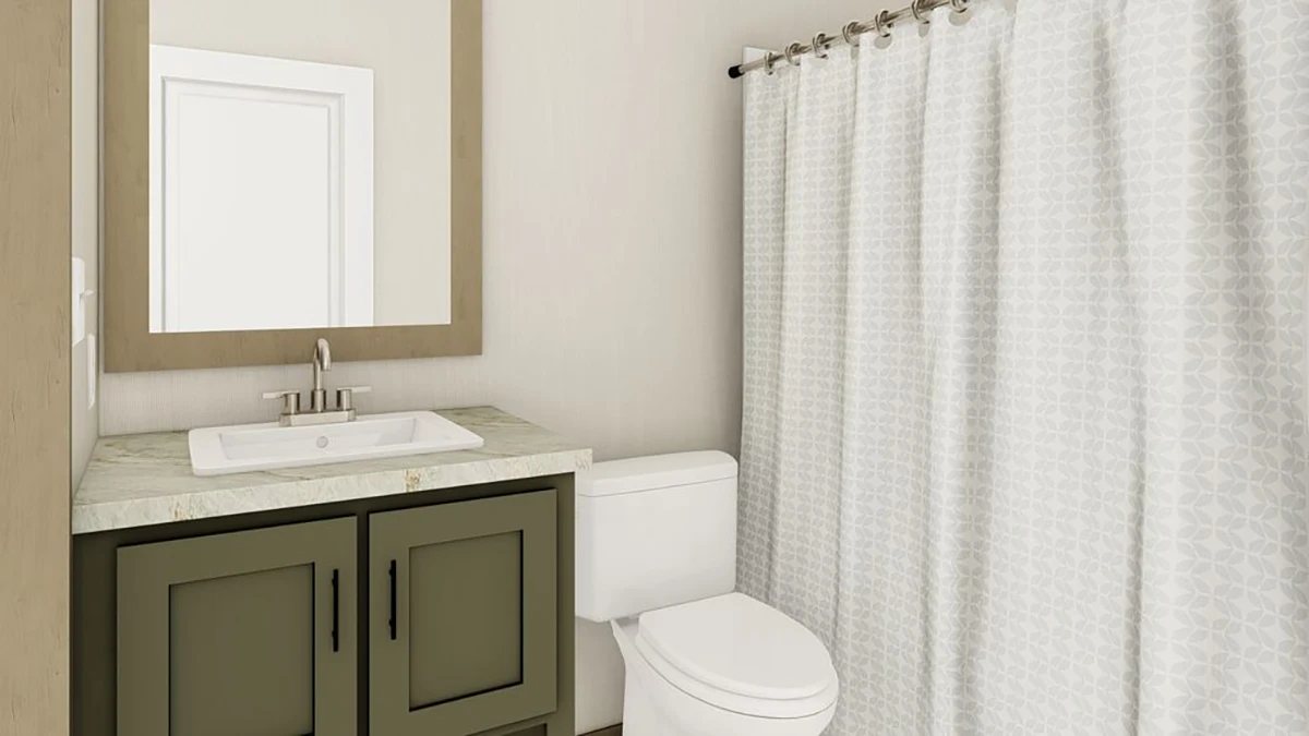 A bathroom with a sink, olive green vanity, wall mirror, white toilet, and white patterned shower curtain.