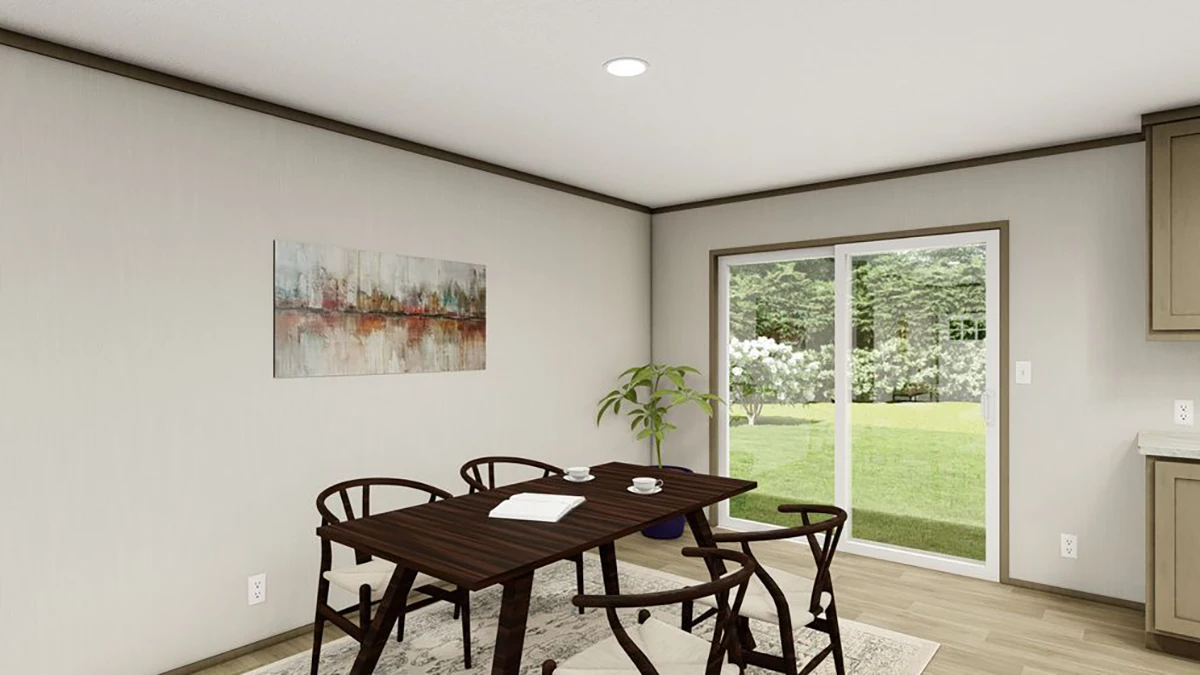 285c6dba-460d-4b03-acf0-0b780dbb4d16 A dining area with a dark wooden table, four chairs, a potted plant, wall art, and sliding glass doors leading to a green yard.