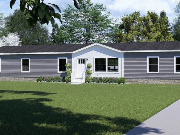 Single-story gray manufactured home with white trim, a central front door, multiple windows, and a neatly landscaped lawn with trimmed grass and bushes.
