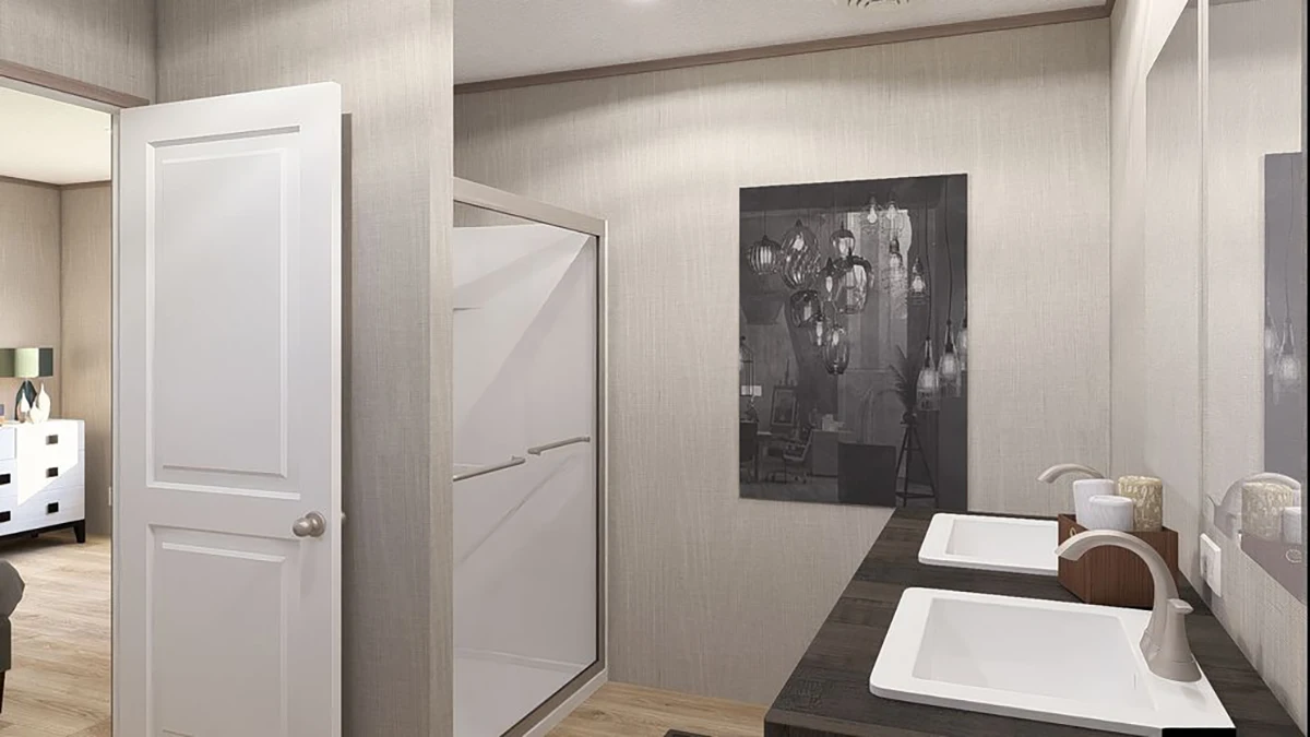 2de6d157-f8fd-4621-9432-df3d9cde7c0a Modern bathroom with a glass-enclosed shower, double sinks on a dark vanity, and a wall art piece; an open door leads to a bedroom.