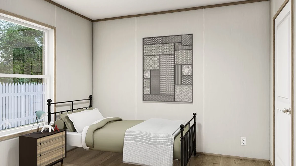 38786fb5-7c7e-4bff-81da-00b8fba00186 Bedroom with a twin bed, a nightstand, and a decorative wall piece. A window shows a white picket fence.