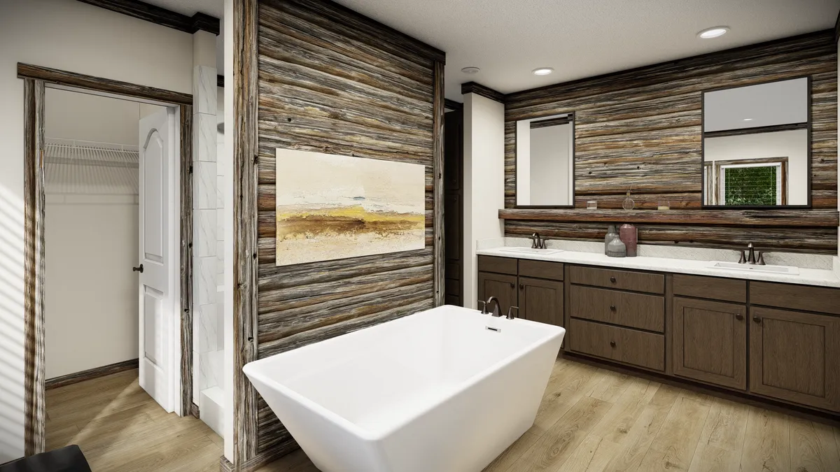 400ce682-2817-41d9-9460-2b921b8d3881 Modern bathroom with wood panel walls, a freestanding white tub, double-sink vanity with a large mirror, and a door leading to a closet.