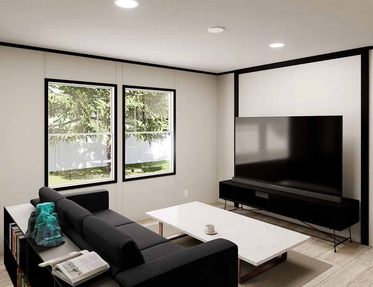 40685316-1231-4bbd-afe8-b2cc0998a5c3 A modern living room with a black sofa, white marble coffee table, large flat-screen TV on a black stand, and two windows showing green trees outside.