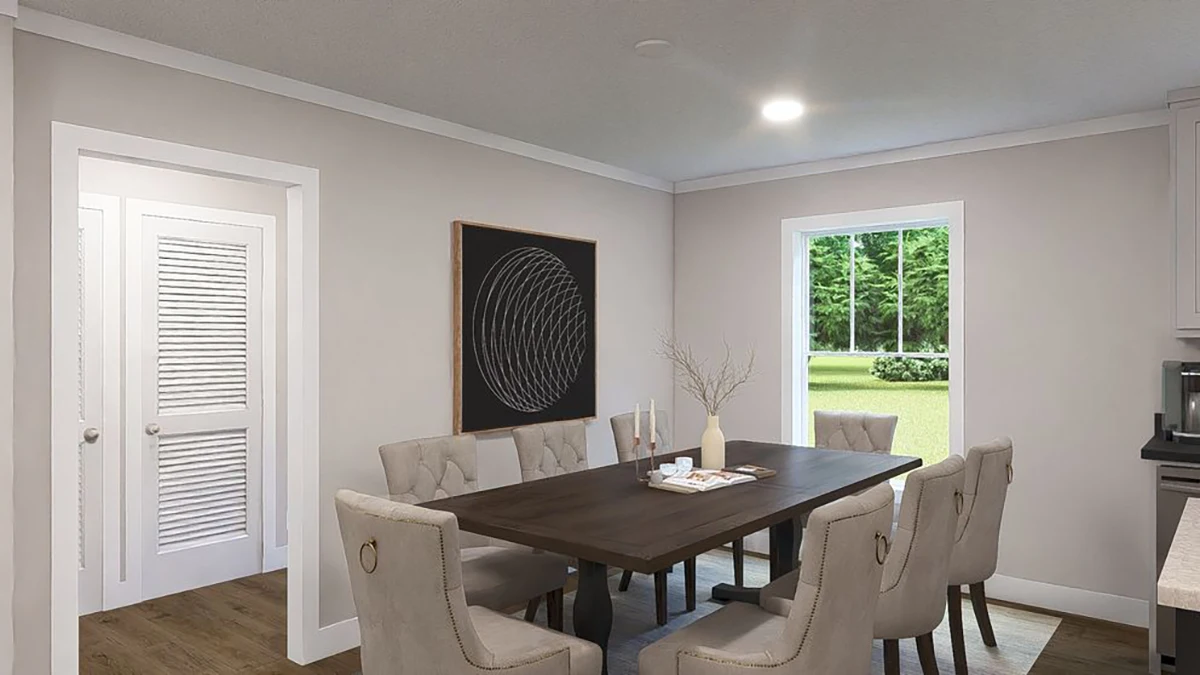 A modern dining room with a dark wooden table, six upholstered chairs, wall art, candles on the table, and a window overlooking greenery.