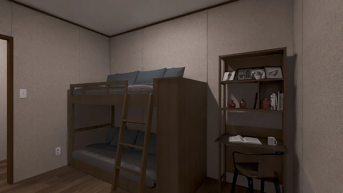 A small room with bunk beds on the left and a wooden desk with shelves, books, framed photos, and an open notebook on the right.