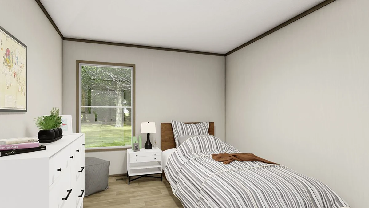 628aa413-7d7a-4113-9678-00f196ec1469 A small bedroom with a single bed, striped bedding, white nightstand, lamp, dresser with books and plant, and a window showing trees outside.