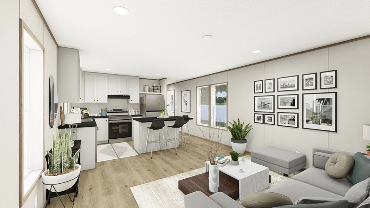 62e84314-bc69-4088-be7b-c5d4acb5d441 Modern open-concept living room and kitchen with neutral decor, light wood floors, houseplants, barstools, and framed art on the wall.