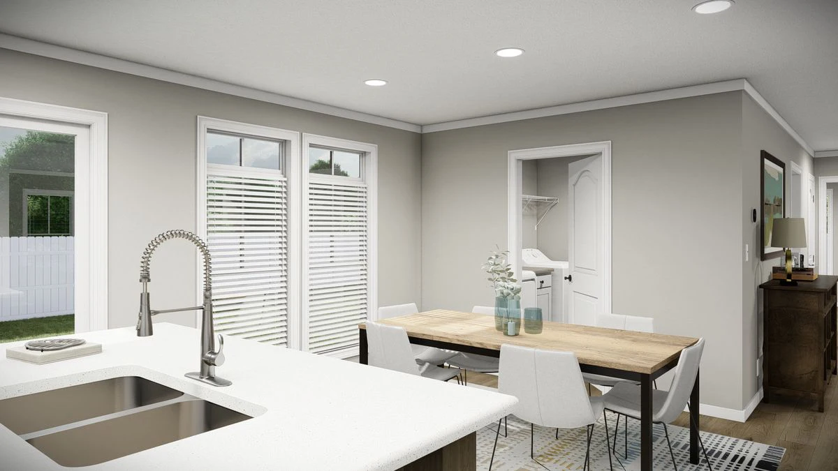 632fc6a5-fb6c-4787-857d-85c8f3d37574 Modern kitchen and dining area with white countertops, a wooden dining table, white chairs, large windows with blinds, and a view into a laundry room.