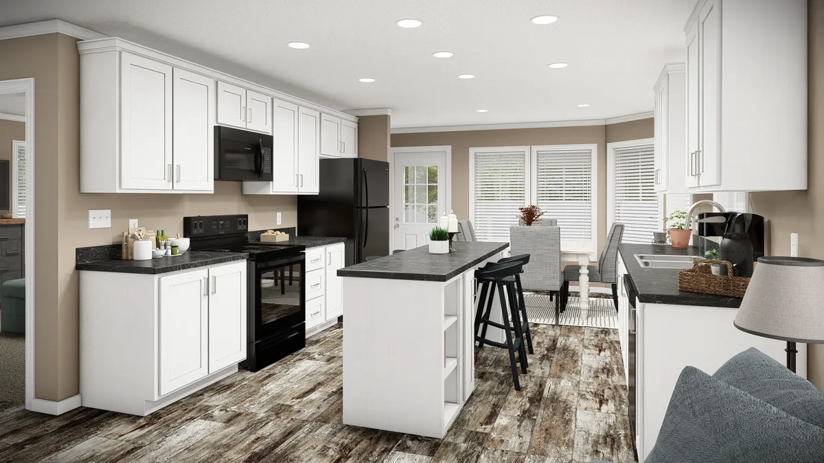 64964414-02cd-431b-ace5-cd43f5414ca7 Modern kitchen with white cabinets, black appliances, an island with stools, large windows, dining table, and wood-look flooring. Neutral walls and recessed lighting complete the space.