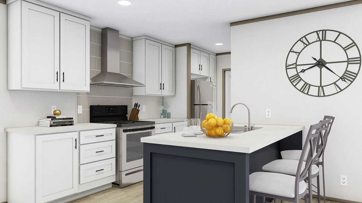 Modern kitchen with white cabinets, stainless steel appliances, a gray island with bar stools, a bowl of lemons, and a large wall clock.
