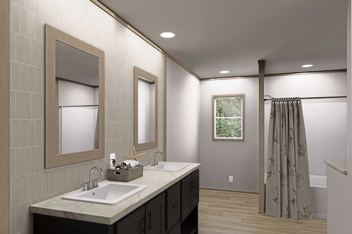 68d77fe1-9ac9-45b9-a97a-921e009143ae Modern bathroom with double sinks, two mirrors, a marble countertop, a window, wood-style flooring, and a shower area with a floral curtain.