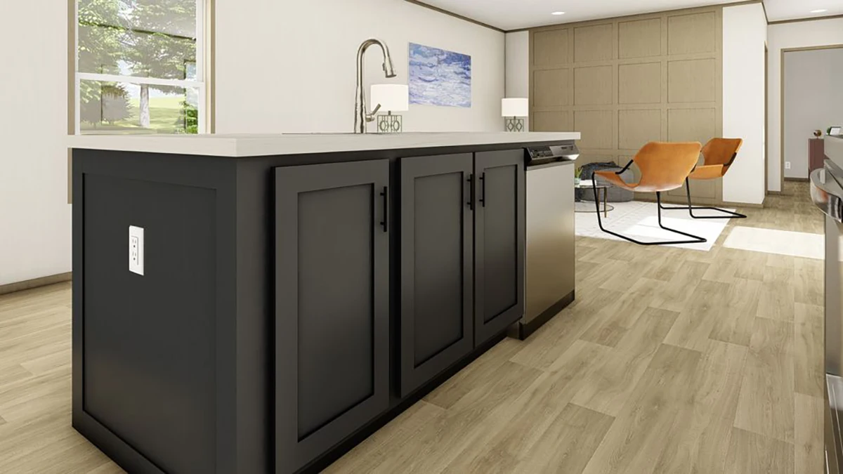 Modern kitchen island with dark cabinets, sink, and faucet in an open living area featuring wood floors, two orange chairs, and a wall with square paneling.