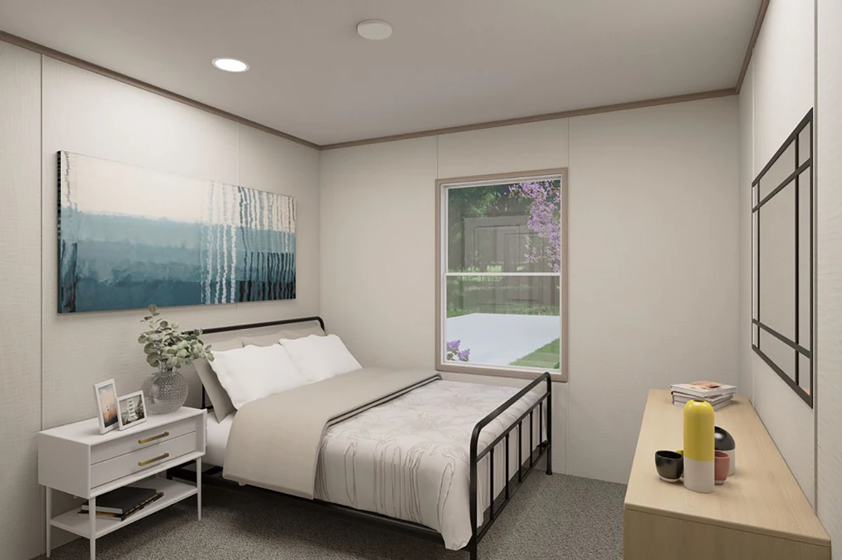 72f5ecf8-bd79-4e40-a3e1-4f026b095ba6 A minimalist bedroom with a bed, nightstand, dresser, large wall art, and a window showing greenery outside. The decor is neutral with simple furnishings.