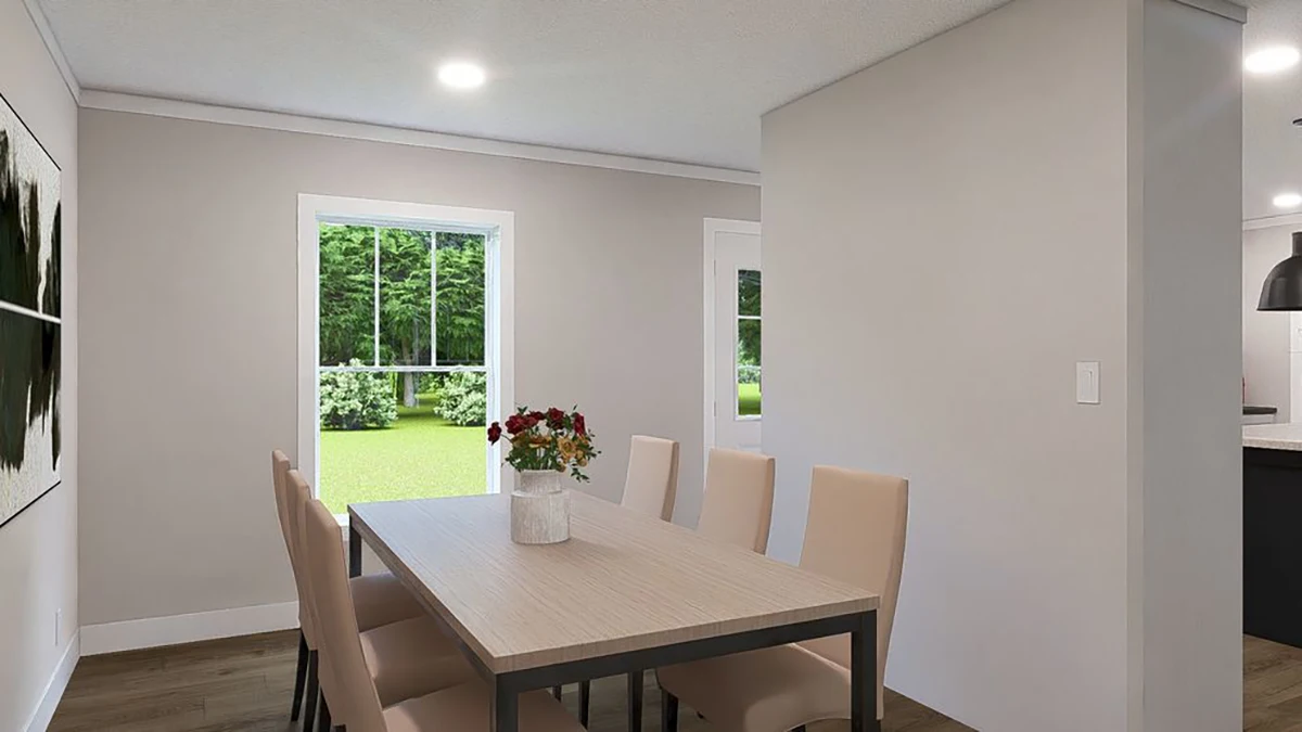 A modern dining room with a wooden table, six beige chairs, a vase of flowers, large window, and view of a green yard. Neutral wall colors and bright lighting.
