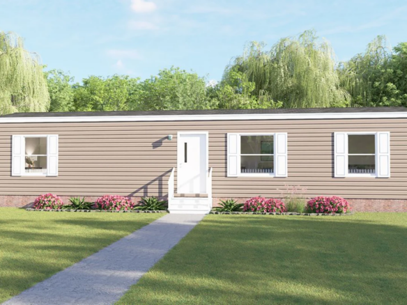 A single-story beige manufactured home with white shutters, a central front door, small front steps, and simple landscaping on a grassy lawn.