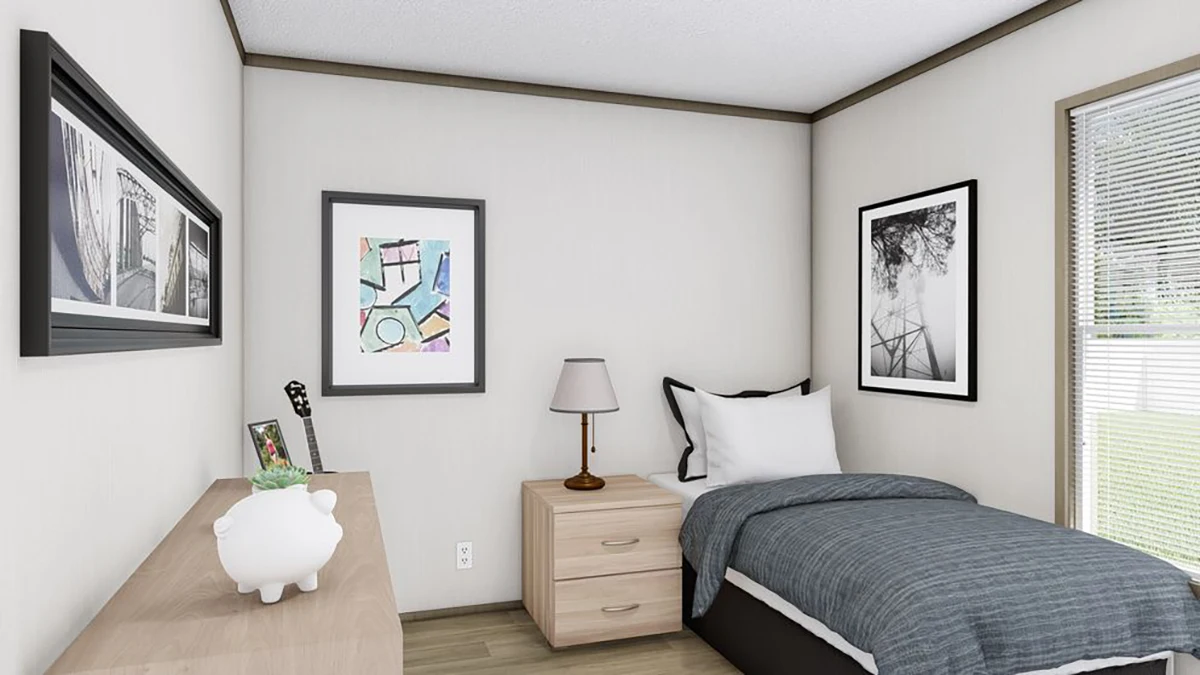 A small, neatly arranged bedroom with a single bed, nightstand, lamp, dresser, framed art, guitar, and a window letting in natural light.