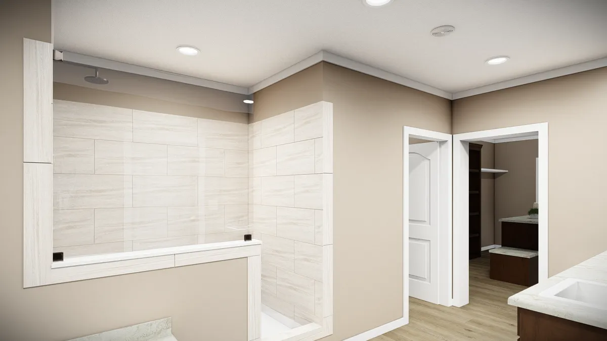 7c6878b3-de63-4158-ad4f-6b6df2322672 Modern bathroom with beige walls, recessed lighting, large walk-in shower with tiled walls, white trim, and an adjacent open doorway leading to a closet or storage area.