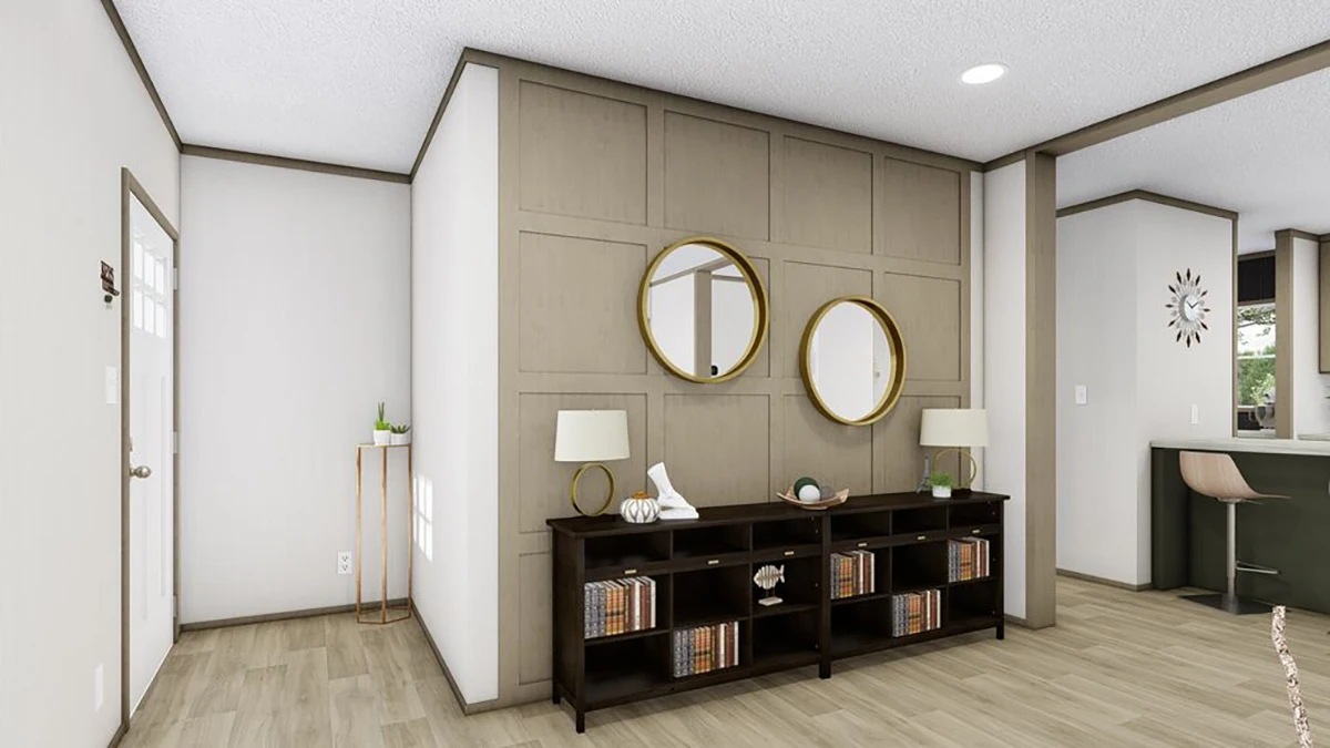 Modern entryway with light wood floors, a console table with books and decor, two round mirrors, table lamps, and neutral-colored walls.